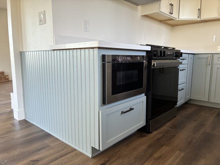 Custom bead board kitchen island cabinetry
