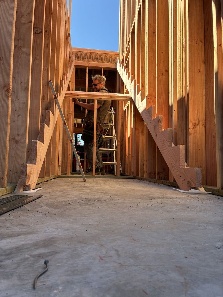 Chris building stair stringers on a Poulsbo new build
